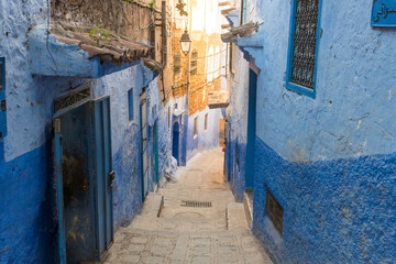 Morocco, Chefchaouen, Narrow alley and traditional blue houses
