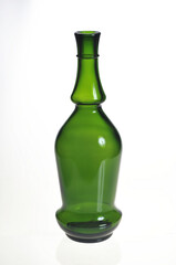 Original green empty wine bottle isolated on a white background