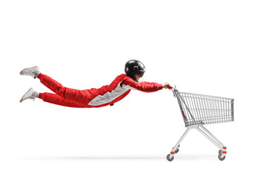 Car racer flying and holding a shopping cart