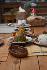 A typical Turkish dinner side dish and lamb stew for the main course.  Lamb tandoori  and Turkish foods.