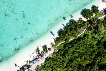 Drone point of view of tropical Maiga Island bajau laut village in Semporna