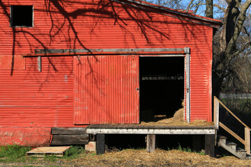 red barn door hanging doors metal corrugated entrance horse cow cattle shelter feed store warehouse farming building