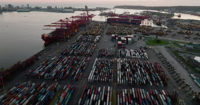 Aerial panning view of shipping containers on the docks at Durban harbour, South Africa