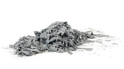 Pile of charred paper isolated on a white background. Burned paper scraps.