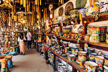 Fototapeta na wymiar Variety of Colorfull Mexican Traditional Souvenirs at Market in Mexico.