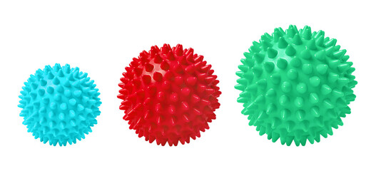 Multicolored spiny massage balls isolated on white. Concept of physiotherapy or fitness. Closeup of a colorful rubber ball for dog teeth on a white color background. Corona virus model.