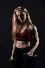 A her shiny kira dumbbells holds knightly beautiful as in hands girl dumbbells black body, In the afternoon health fit for exercise and trainer strength, sportswear wellness. Sweat model