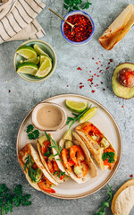 Diet healthy tacos with shrimps and avocado.