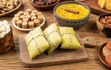 Typical brazilian june festival food over wooden table. Festa junina