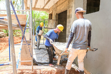 group of house construction carpenters in africa at work industry