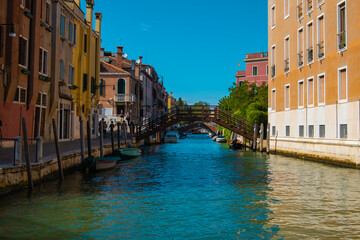 Obraz na płótnie Canvas VENICE, ITALY - August 27, 2021: View of empty and calm canals of Venice, Italy.