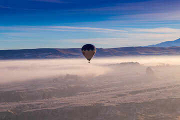 Fototapeta premium Hot air ballons flying over Cappadocia National Park Goreme Turkey