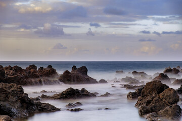 Evening on the Atlantic Ocean - On the north coast of Tenerife
Long exposure - Half an hour before sunset, low tide, the water of the sea has retreated. The rugged rocks overgrown with algae are expos