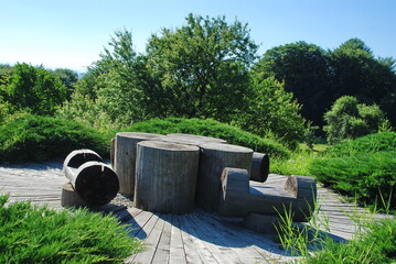 round wooden table and wooden chairs at Ceausescu's cottage at Black Hill, Bistrita, Romania 2008