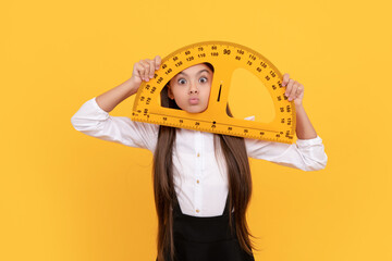 funny teen girl in school uniform hold mathematics protractor for measuring, logic