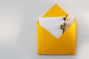 Envelope with a spring of Easter willow.