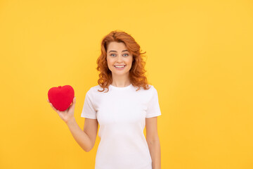 Obraz na płótnie Canvas cheerful redhead woman with love romantic gift. sweetheart. valentines sale.
