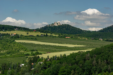 Fototapeta na wymiar Moravian lanscape view with castle Buchlov in the background. Buchlovice, Czech Republic.