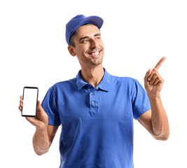 Courier with mobile phone pointing at something on white background