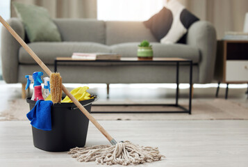 All youll need for deep clean. Shot of a bucket of cleaning supplies.