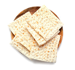 Plate with Jewish flatbread matza for Passover on white background