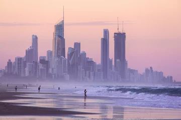 Fotobehang Kust Gold Coast cityscape with people on Miami beach at sunset  © Bostock