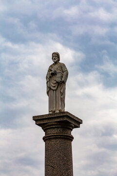 image of Saint Peter in a column with cloudy sky