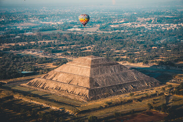 pyramid and hot air balloon in mind flight
