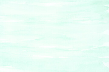 Green watercolor texture on white paper background