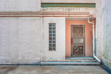 Closed metal door in the old estate apartment