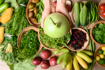 Organic Southeast Asian vegetables and fruits from local farmer market in summer season, Northern of Thailand, Sustainability concept, Table top view