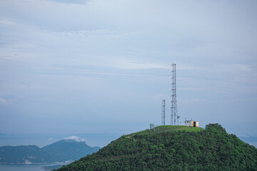 Antenna tower on a peak of a hill
