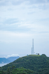Antenna tower on a peak of a hill