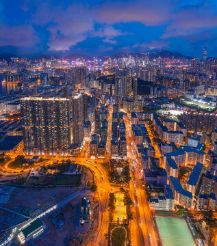 Hong Kong 29 Jun 2019: Aerial view of Night of Kowloon, Light in streets and highway © gormakuma