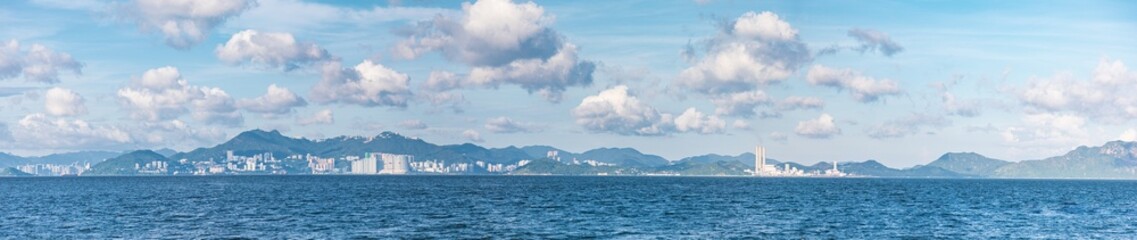 Fototapeta na wymiar Power Plant in distant, Lamma Island, Hong Kong