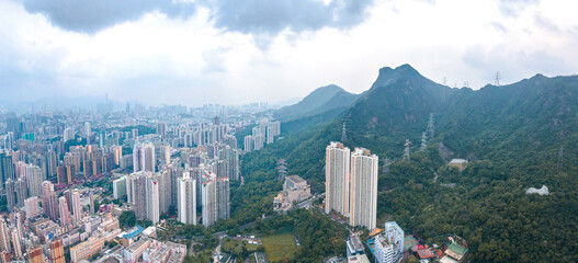 Urban district under the Lion Rock, Kowloon, Hong Kong, famous landmark - obrazy, fototapety, plakaty