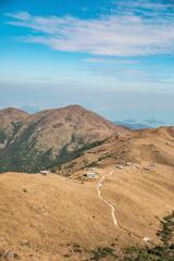 Hikers, Footpath and Houses in the Sunset Peak and Yi Tung Shan, Mountains in Lantau Island, Hong...