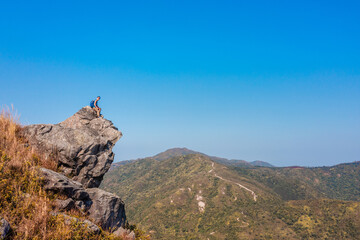 Hiking man on cliff, Sai Kung, Hong Kong