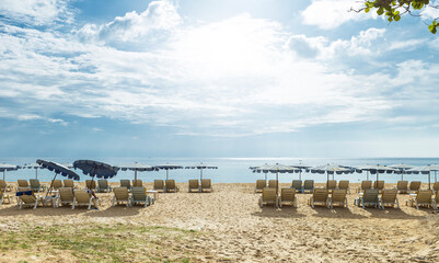 Relaxing on the beach in summer sunny day, sunbed on the beach in south of Thailand, tropical island