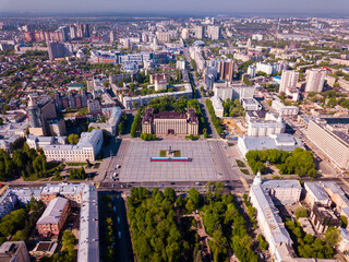 View from drone of center of Voronezh with Lenin Square and panel buildings, Russia