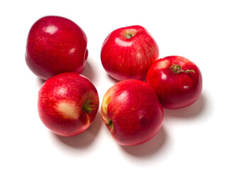 Red apples. Several fruits on a white background. Studio photography. View from above