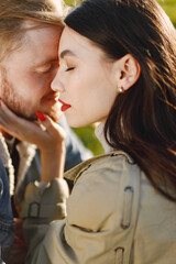 Cropped portrait of a stylish romantic couple on a nature