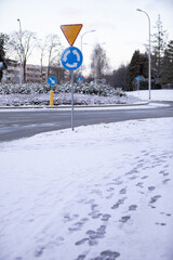 Snowy traffic circle in Lublin. Urban streets at dawn. - obrazy, fototapety, plakaty