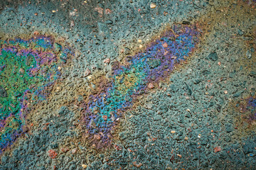 Oil stain, Gas Stain drop from the Car on the Parking Lot Floor