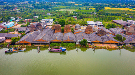 Aerial view of Mang Thit brick kiln in Vinh Long. Burnt clay bricks used in traditional...