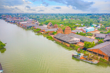 Aerial view of Mang Thit brick kiln in Vinh Long. Burnt clay bricks used in traditional...