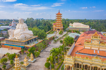 Naklejka premium Aerial view of Vinh Trang pagoda. A historical - cultural monument that attracts visitors in My Tho, Tien Giang, Vietnam. Near Ben Tre. Mekong Delta
