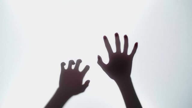 Abstract And Spooky Defocused Hand In Slow Motion
