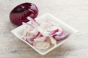 Sliced red onion in the bowl