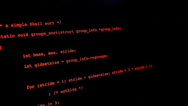 Developer is browsing html code on the computer screen. Scroll of HTML Web Page Code. Programming code abstract technology background. Computer script concept. High quality 4k footage